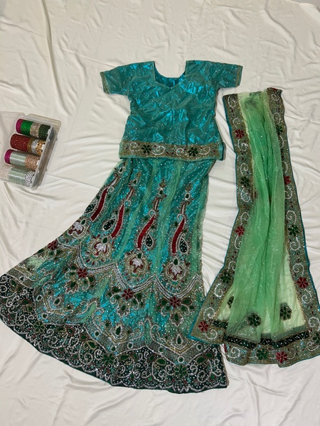 Green shimmery hand embroidered lehenga set