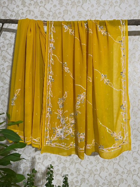 Yellow with white sequined saree