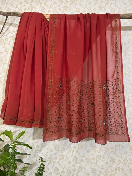 Rust red thread embroidered saree