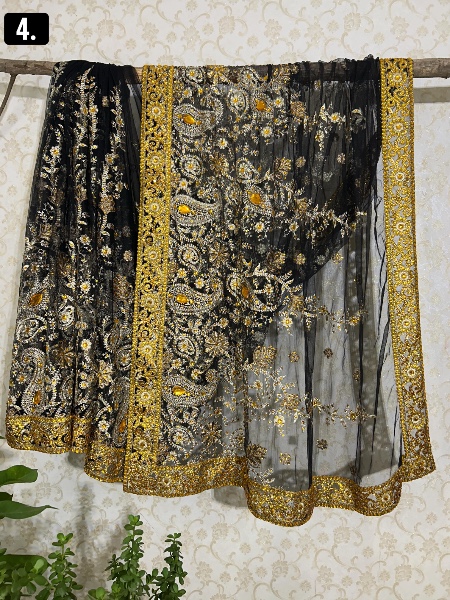 Black with orange kundan work saree