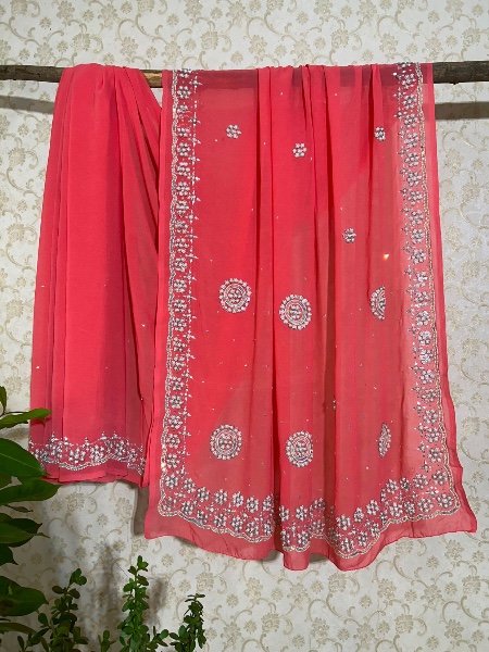 Coral pink with white beads saree