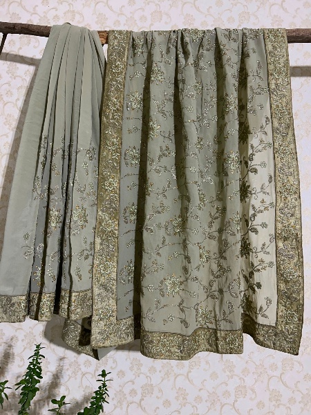 Sage green all over embroidered saree