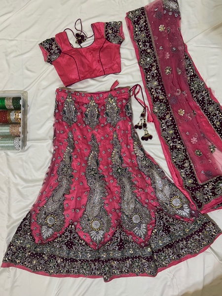 Pink lehenga set with jewellery motifs