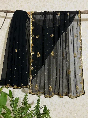 Black saree gold border