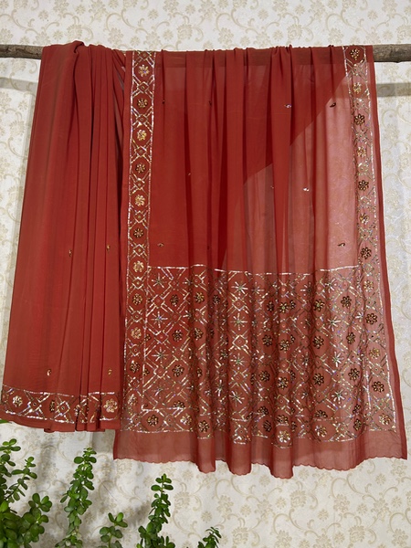 Brick red sequined embroidered saree