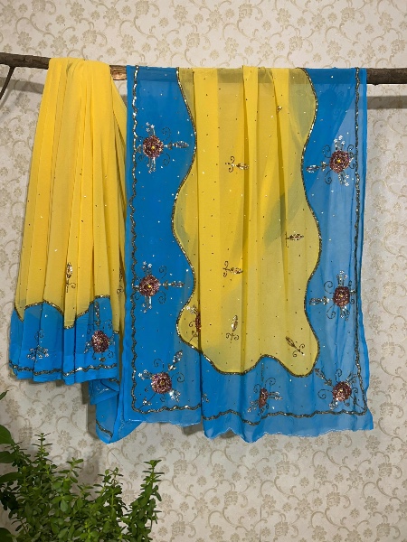 Pretty butter yellow and blue dual colour saree