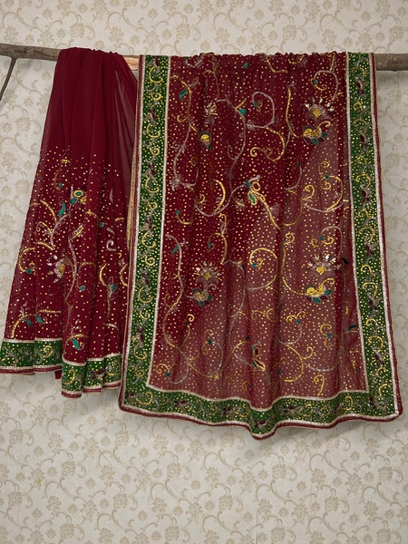 Maroon and green heavy jaal work saree